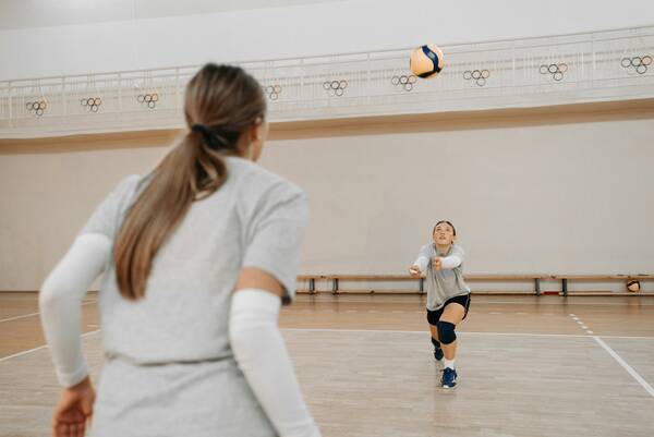 Girl on Volleyball court